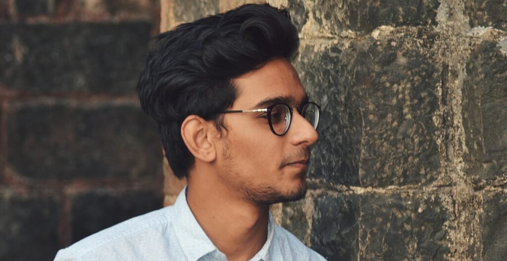 A Indian young man proud and cofident from Indian youth association